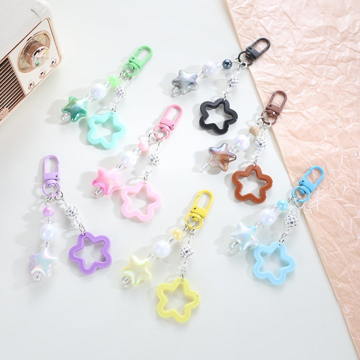 Playful keychain with floral and star motif Stornfield