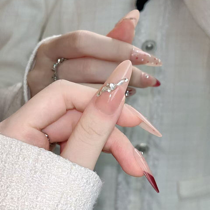 Artistic Press-On Nail Extensions with Decorative Patterns Stornfield