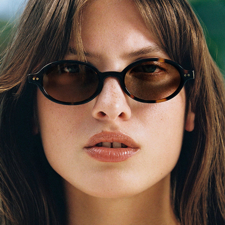 Ladies fashionable oval-shaped sunglasses with fancy frame Stornfield