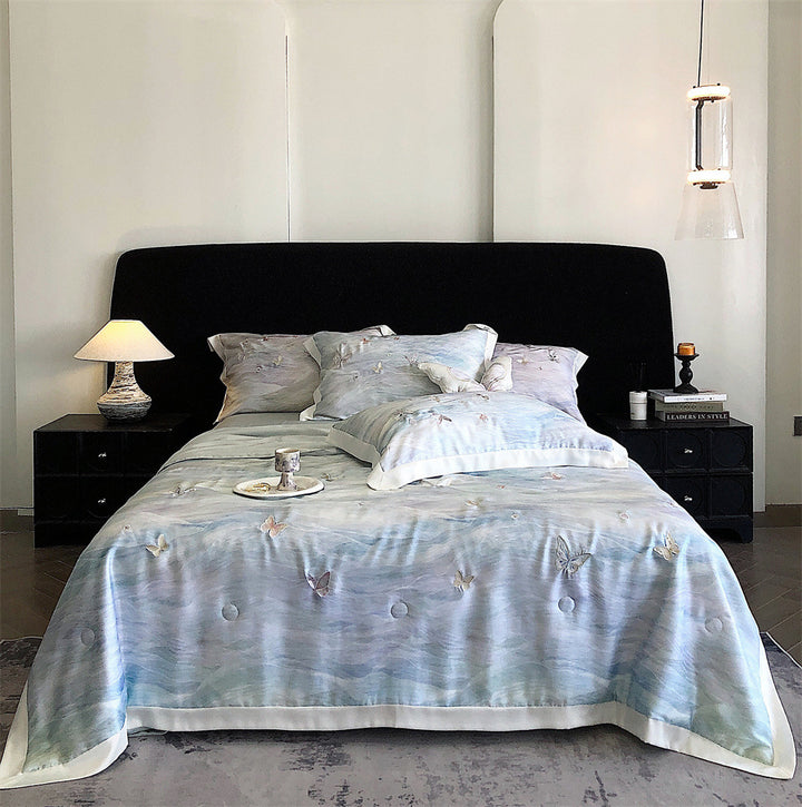 Luxurious satin bedding set with butterfly embroidery and decorative pillow