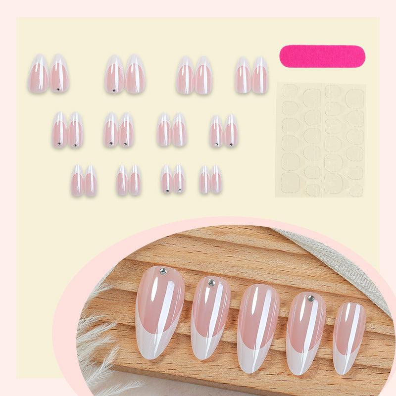 Artificial nail set with elegant French tips and glitter accents Stornfield