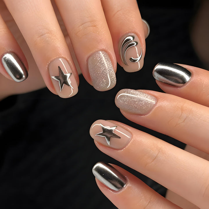 Acrylic nail set with glamorous star motifs and holographic effects Stornfield