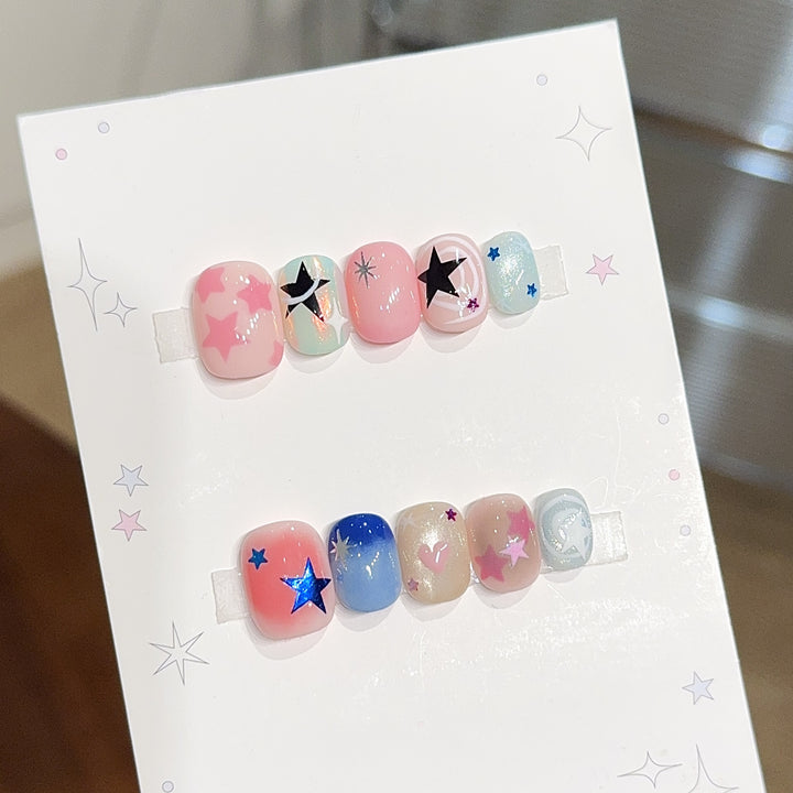 Artificial nails with glamorous star motifs Stornfield