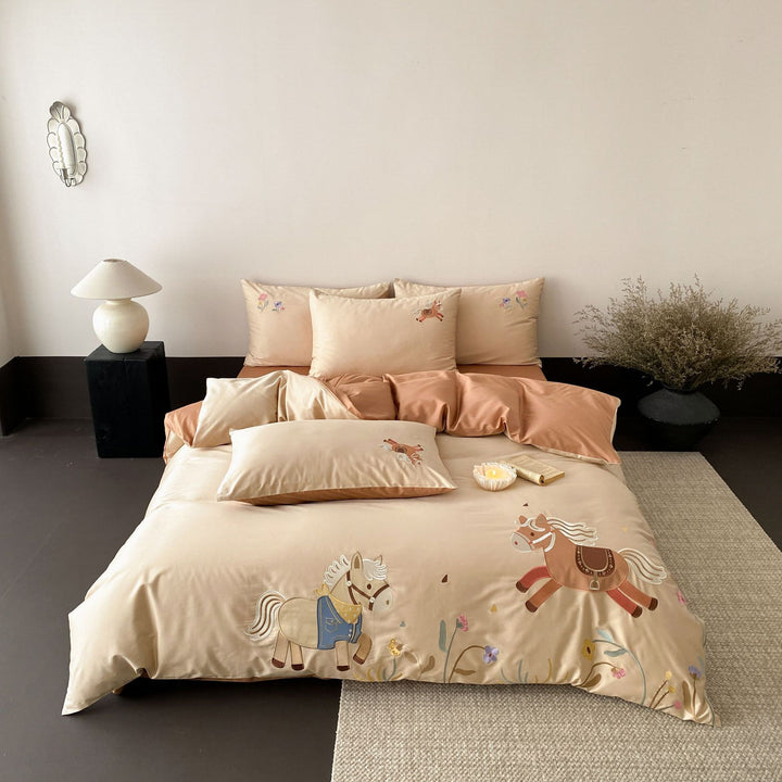 Children's satin bed linen set with embroidered rocking horse applications and velvety texture