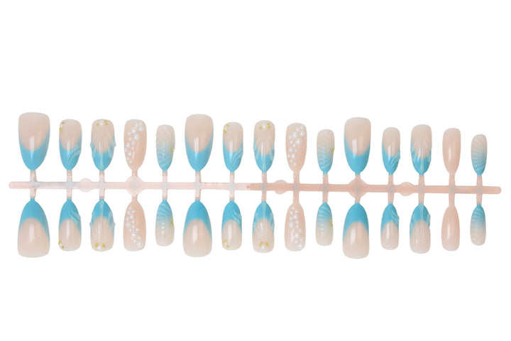 Art nail set with elegant shell and pearl decorations Stornfield