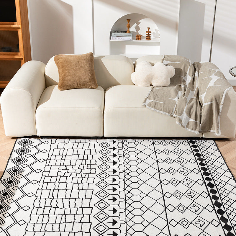 Geometric flat-woven living room rug with stripe and tile pattern