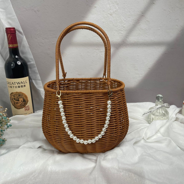 Women's stylish rattan container with pearl handle Stornfield