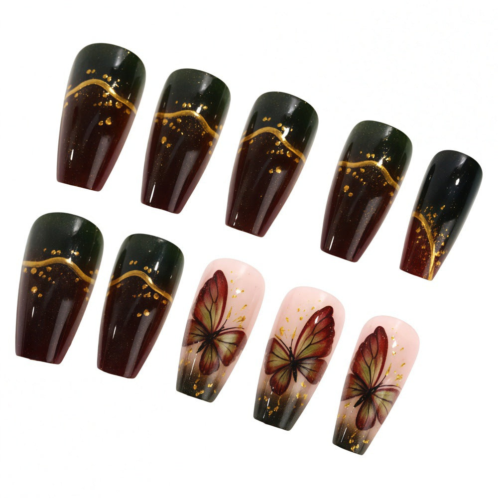Artificial nails with elaborate butterfly and flower designs Stornfield