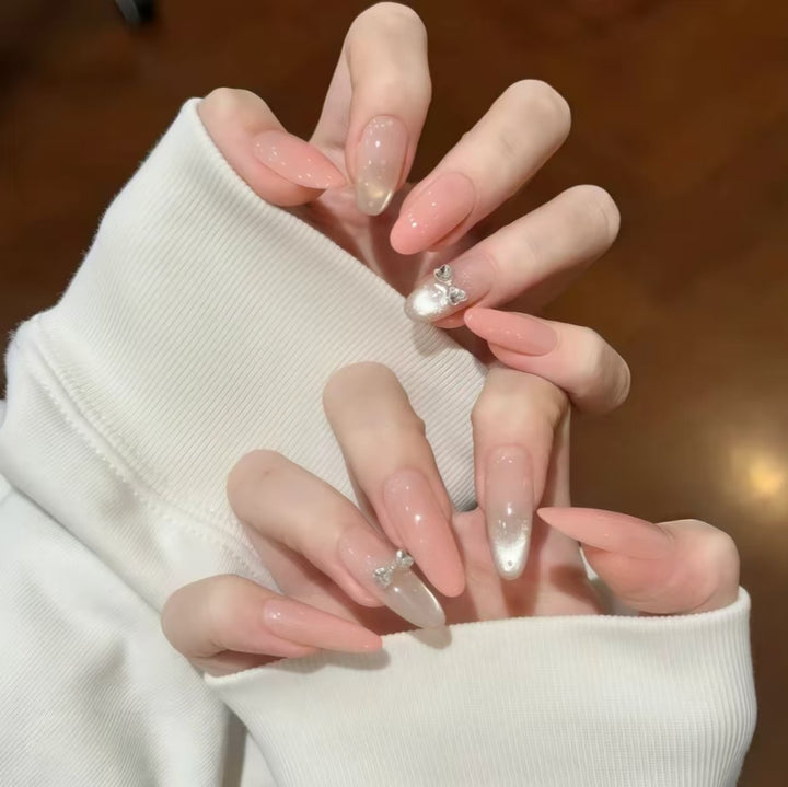 Elegant Nail Extensions with Butterfly Accents