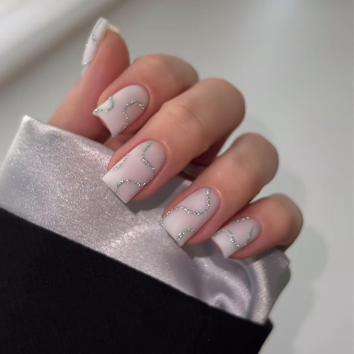 Nail art set with elegant glitter contour design Stornfield