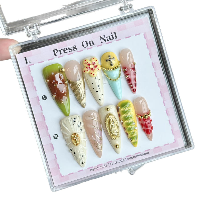 Artistic Press-On Nail Set with Floral and Green Accents
