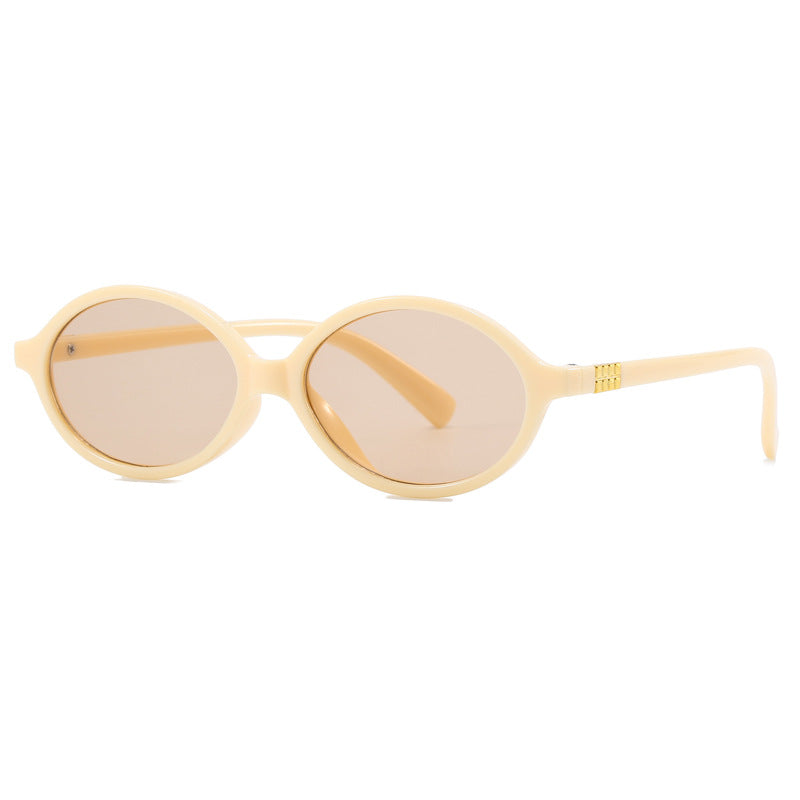 Women's fashionable sunglasses with oval frame and golden accents Stornfield
