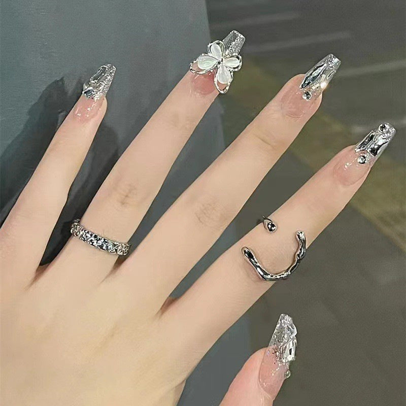 Glamorous Press-On Nail Set with Floral and Glitter Accents Stornfield