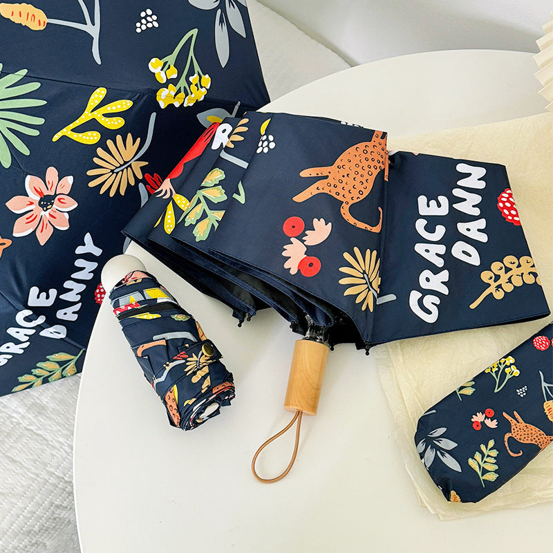 Women Folding Umbrella with Striking Flower Pattern Stornfield