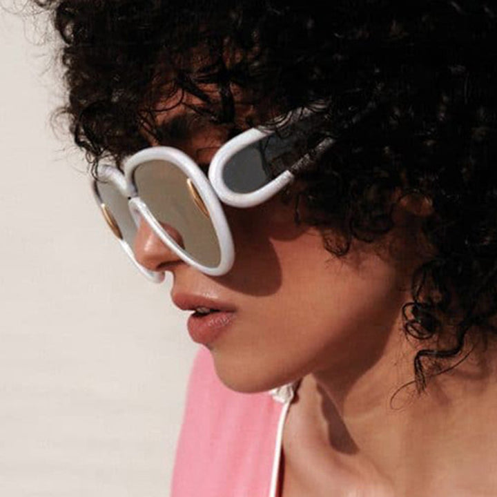 Women extravagant sunglasses in creative design Stornfield
