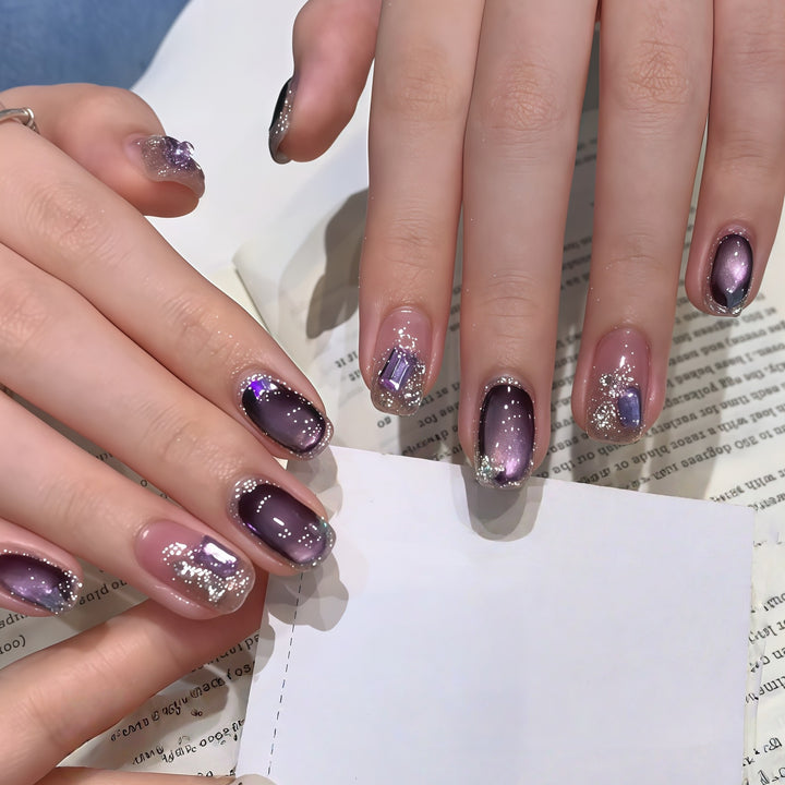 Glamorous nail tips with ombre effect and glitter Stornfield