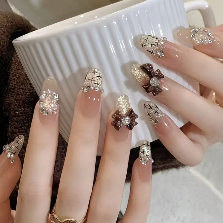 Artificial nails with glamorous decor Stornfield