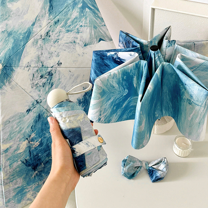 Ladies elegant folding umbrella with unique marble pattern Stornfield