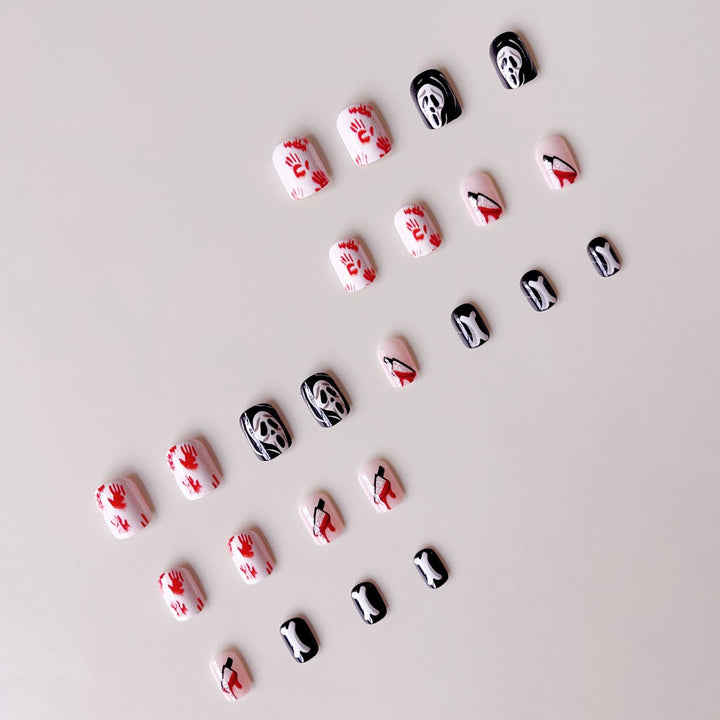 Creative Halloween Nail Art Set with Creepy Designs and Sparkling Accents Stornfield
