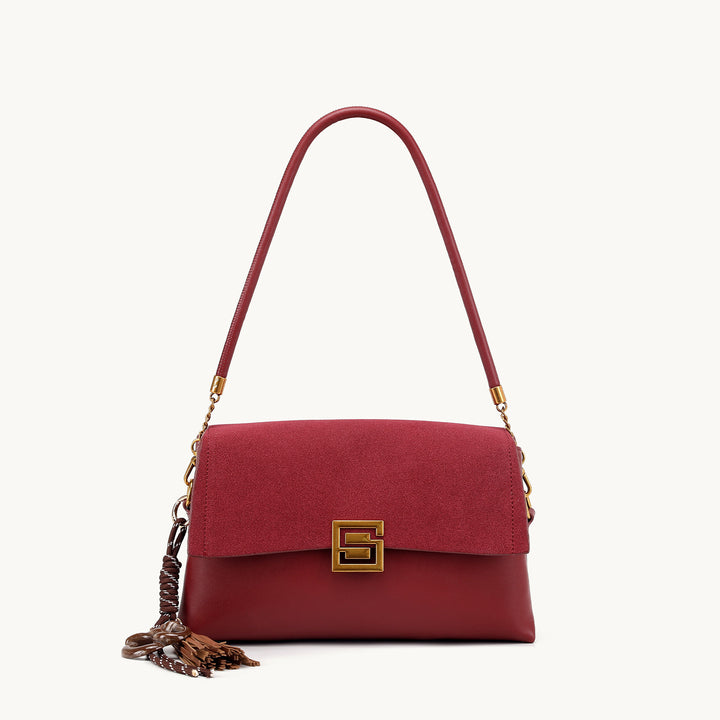 Elegant Suede Handbag with Gold Accents