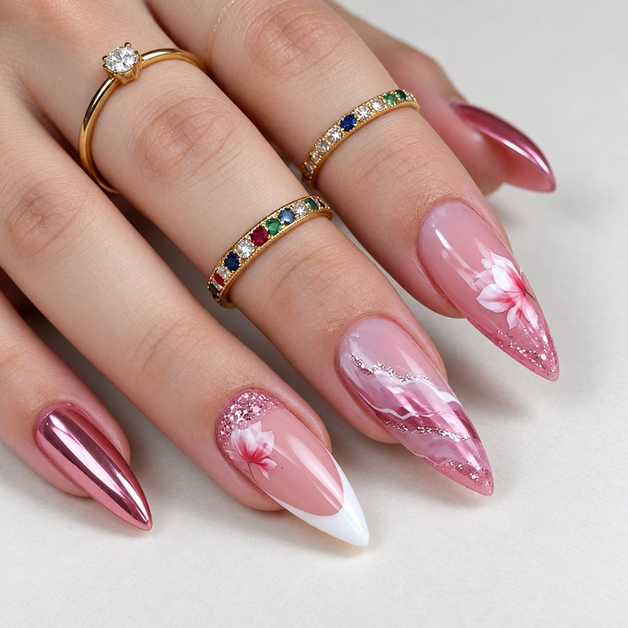 Acrylic nail set with floral patterns and glitter elements Stornfield