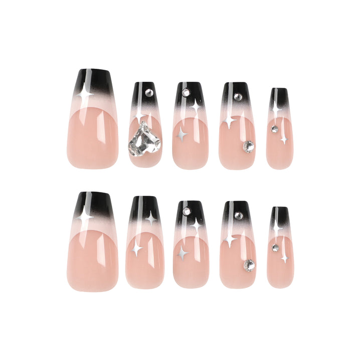 Artificial nail extensions with elegant ombre design and glitter accents Stornfield