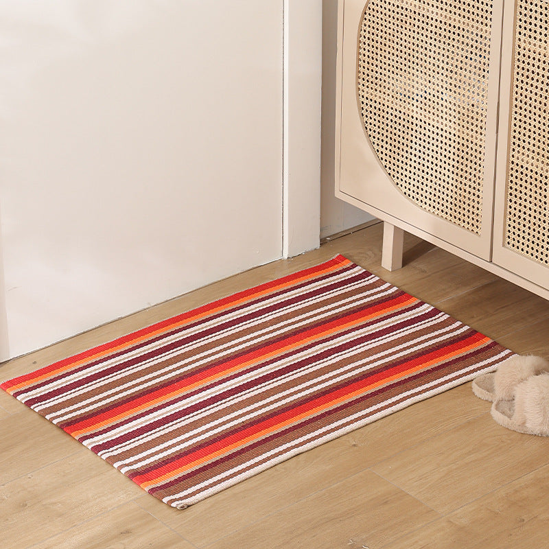 Flat striped carpet runner made of cotton blend with anti-slip coating and easy-care woven structure