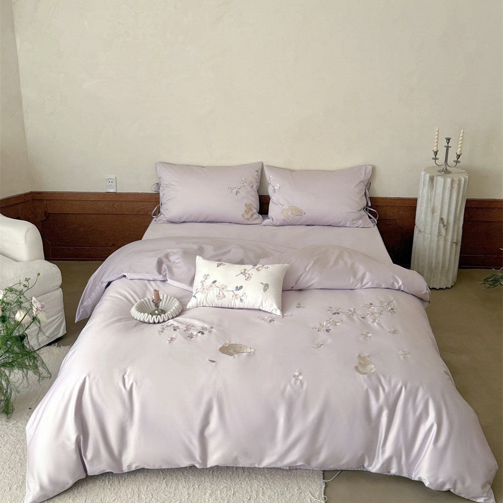 Embroidered satin bedding set with cat and flower motif