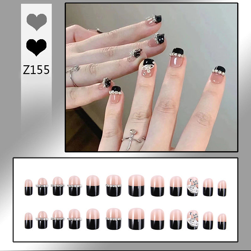 Glamorous artificial nail set with sparkling crystal embellishments Stornfield