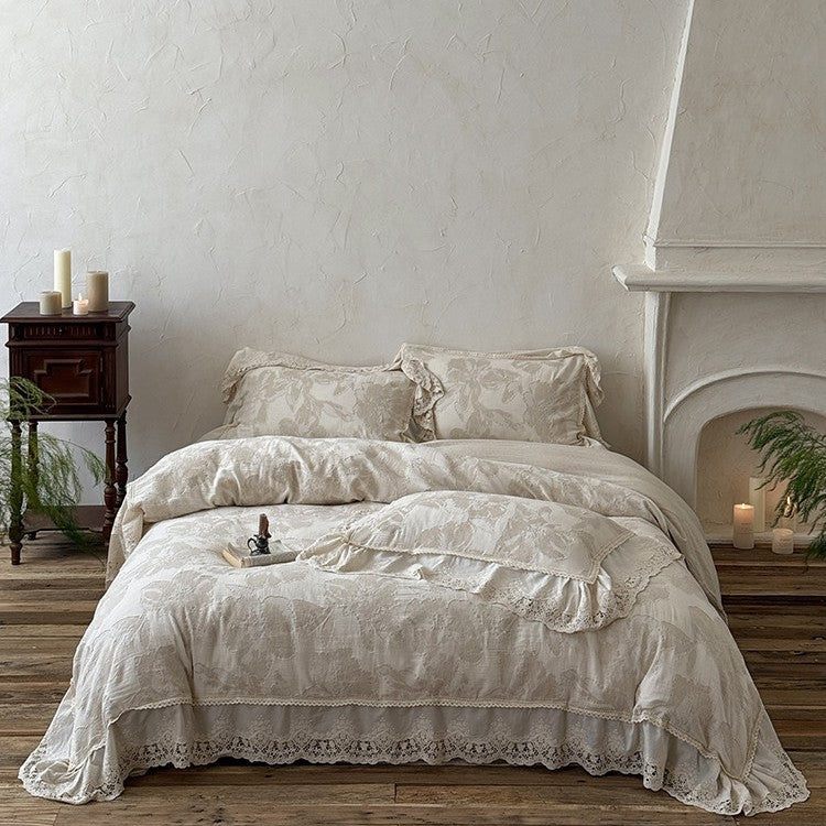 Vintage-inspired cotton-linen bedding set with large floral pattern, ruffle, and lace appliqué