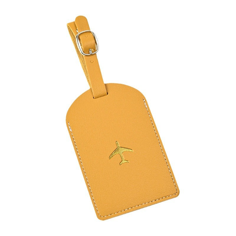 premium leather luggage tag with adjustable buckle strap and embossed airplane Stornfield