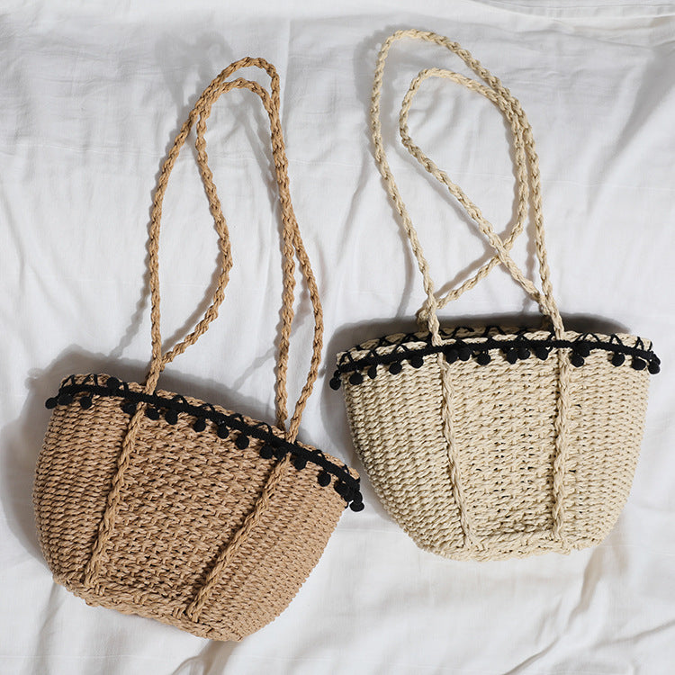 Delicate beach bag with pompons Stornfield