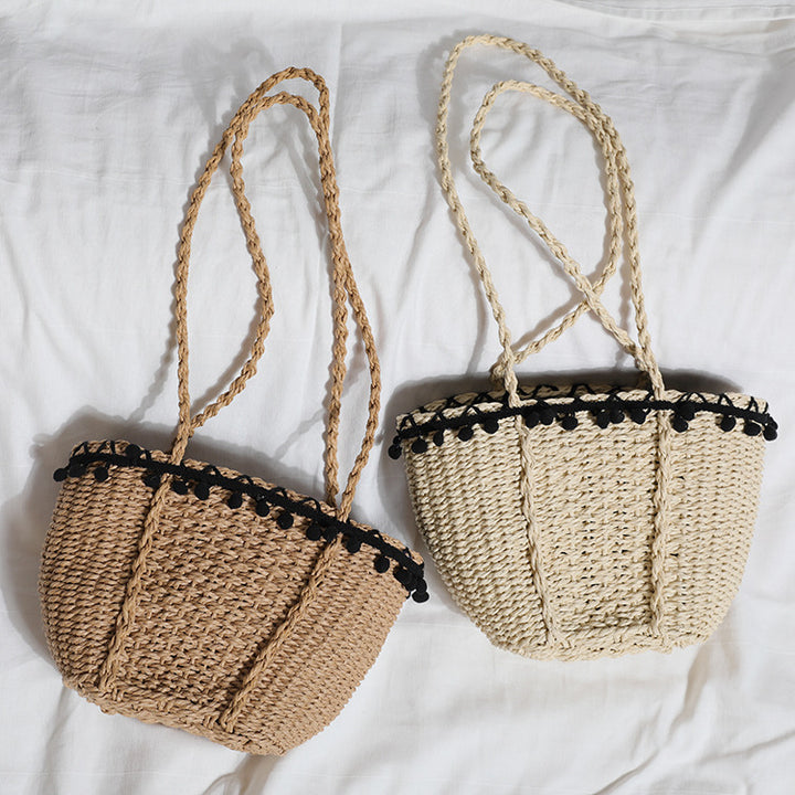 Delicate beach bag with pompons Stornfield