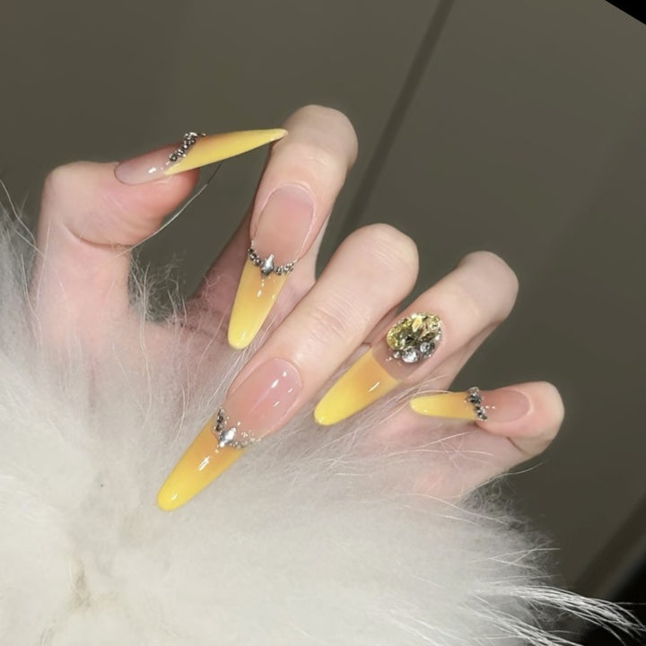 Artificial nails with luxurious glitter and gradient color Stornfield