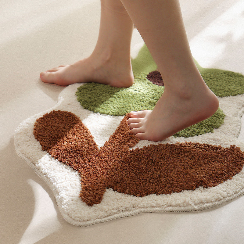 Flower-shaped hand-tufted bath mat with voluminous pile and non-slip latex backing Stornfield