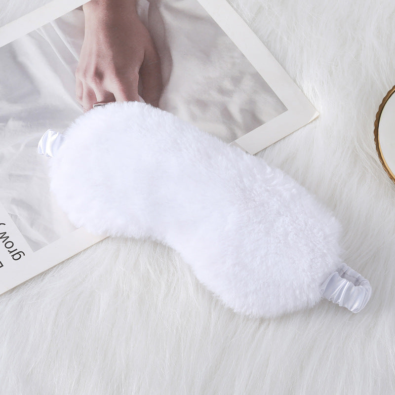 Women's cozy sleep mask made of plush with adjustable elastic band and lightproof inner lining Stornfield