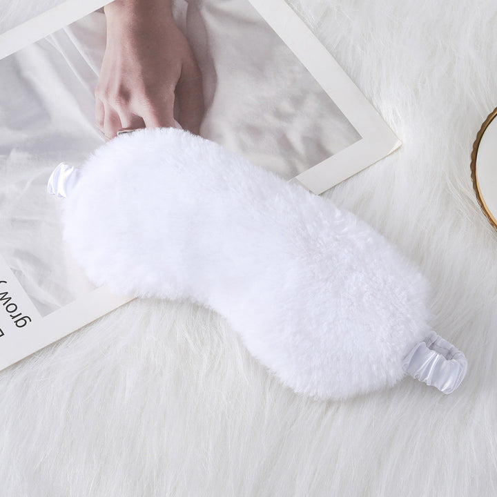 Women's cozy sleep mask made of plush with adjustable elastic band and lightproof inner lining Stornfield