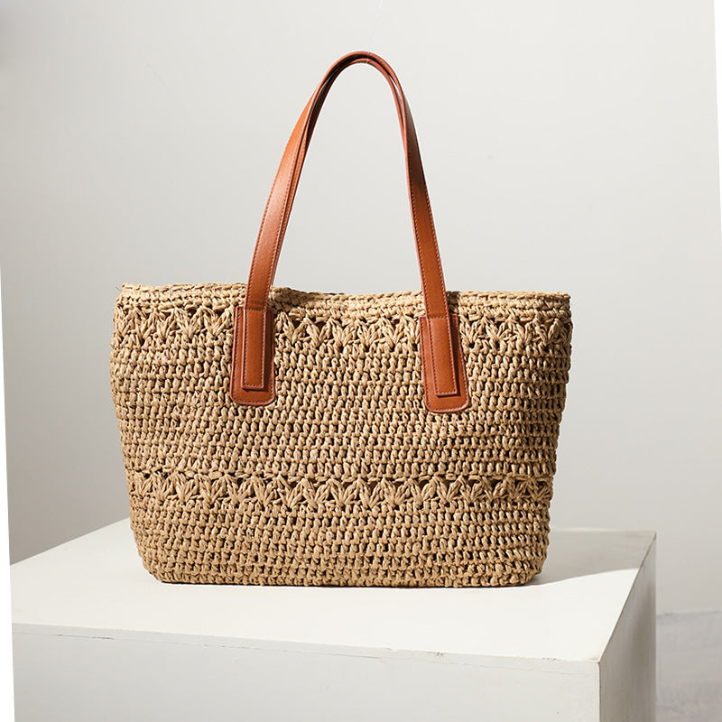 Braided straw bag with sturdy leather handles Stornfield