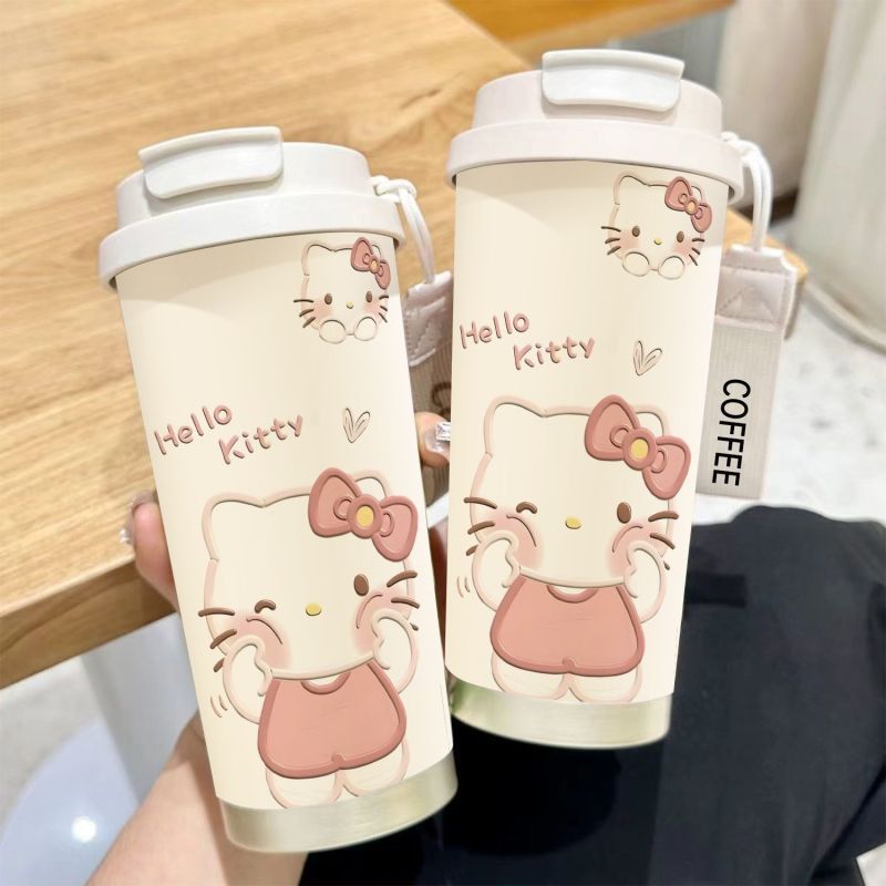 Women's insulated mug with practical carrying handle and charming Hello Kitty design Stornfield