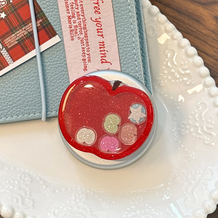 Funnier apple motif smartphone finger holder Stornfield