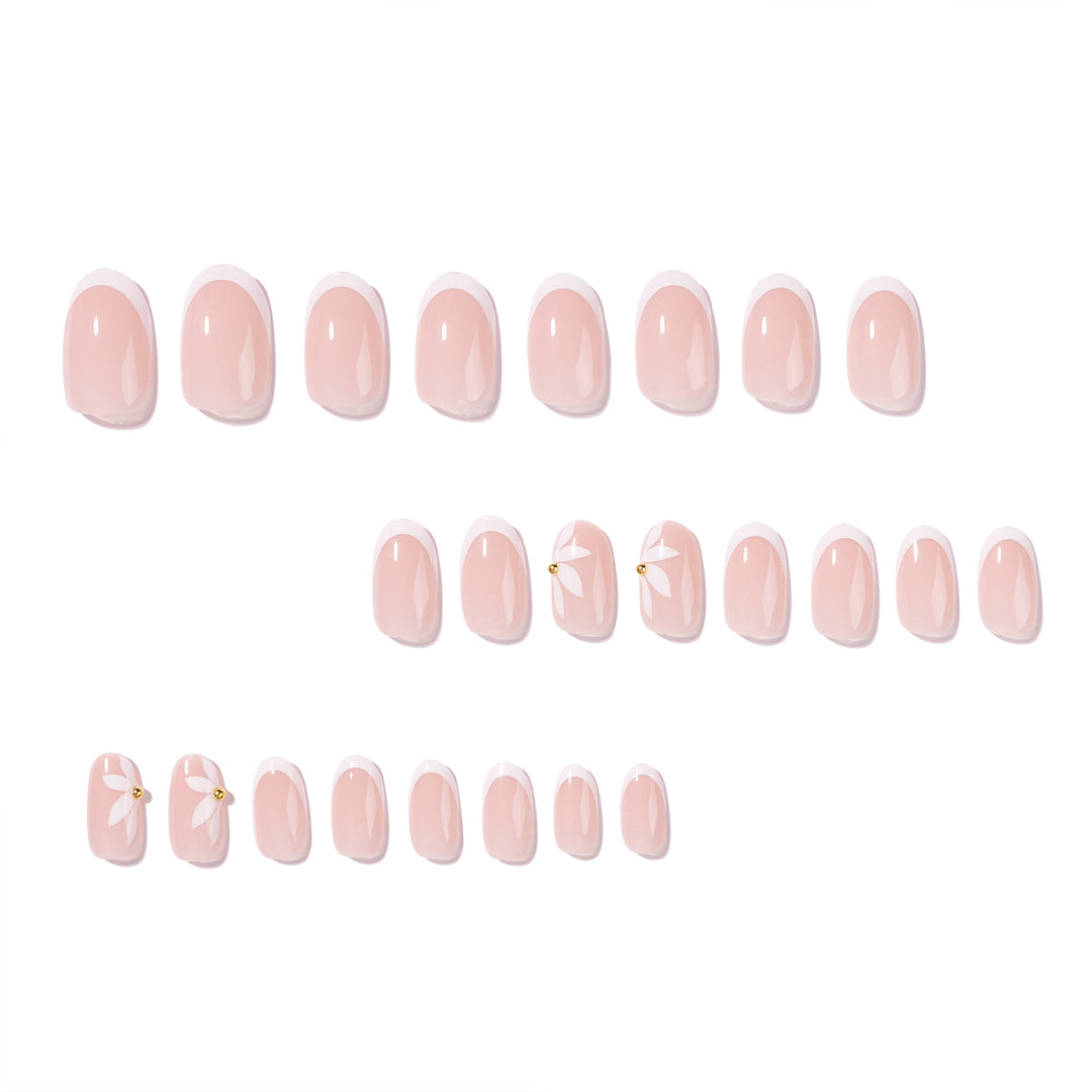 Artful French nails with delicate flowers and glitter accents Stornfield