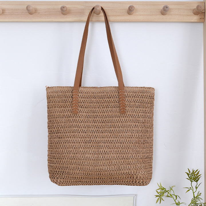 Spacious wicker tote bag with sturdy leather handles Stornfield