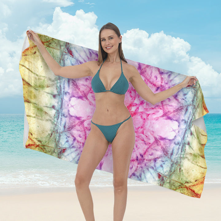 Beach towel with vibrant tropical plant motif Stornfield