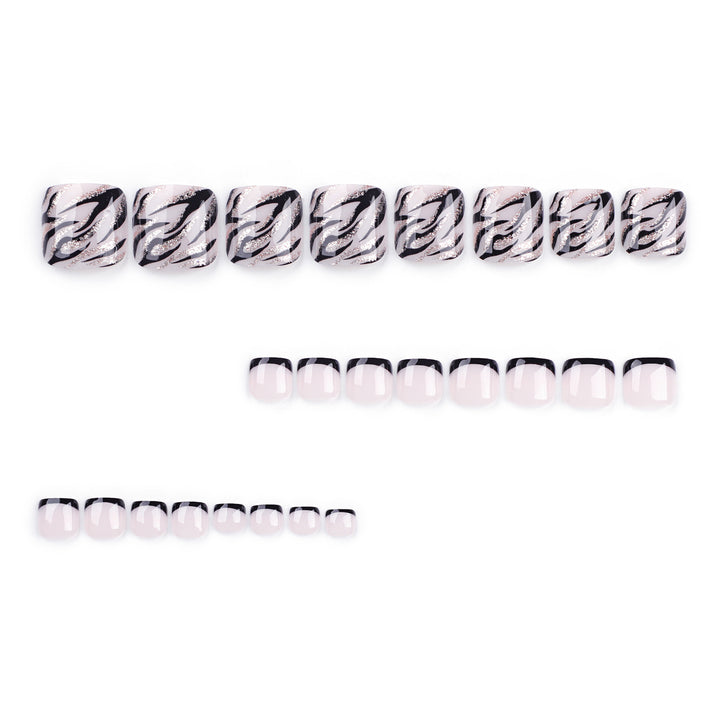 Artificial toenail art in elegant black and white design Stornfield