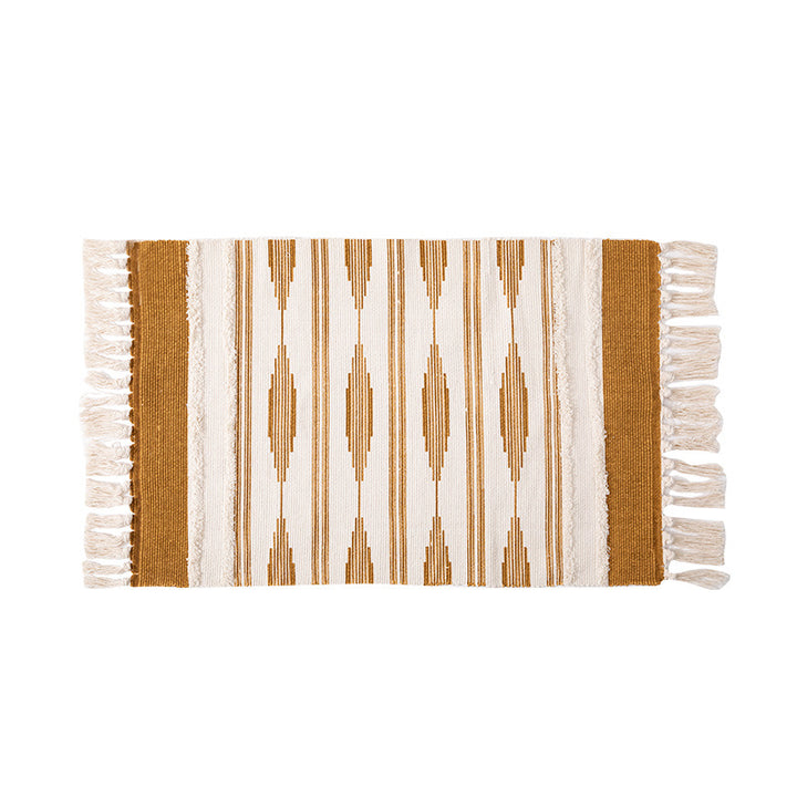 Flat Boho runner rug made of cotton blend fabric with geometric hexagon tufting and decorative fringed edge.