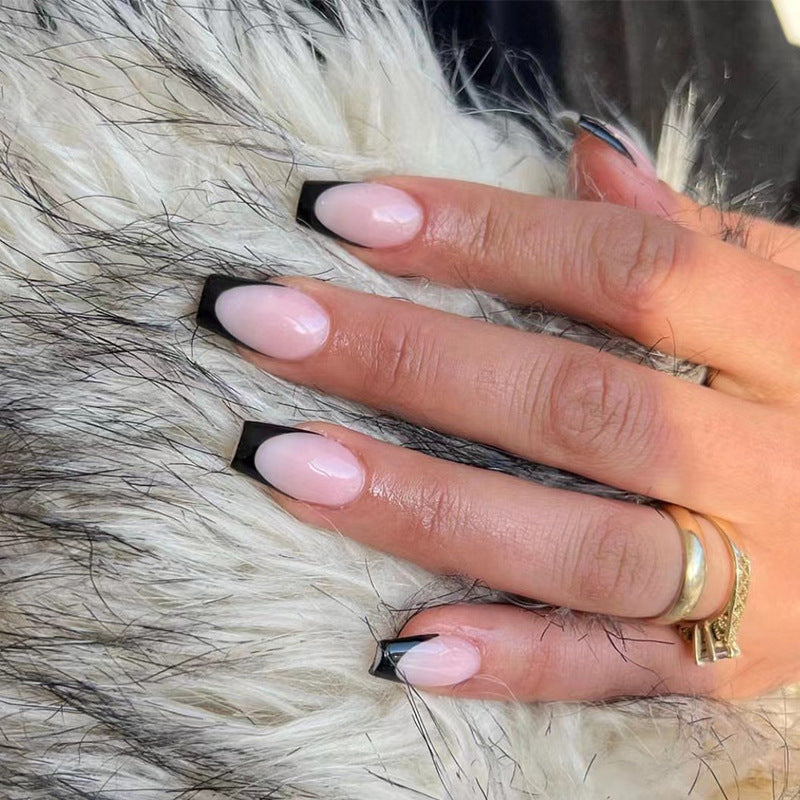 Elegant stiletto nails with contrasting French tip Stornfield