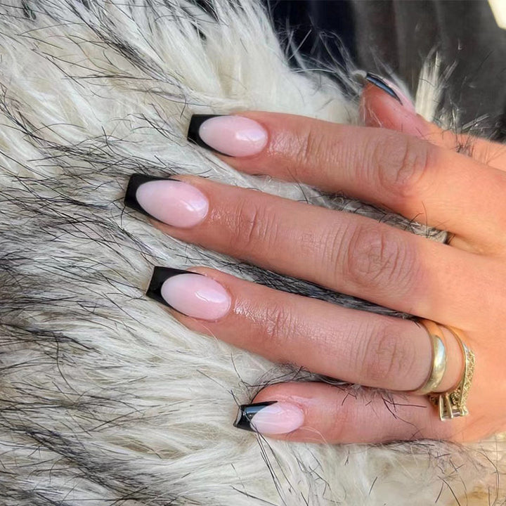 Elegant stiletto nails with contrasting French tip Stornfield