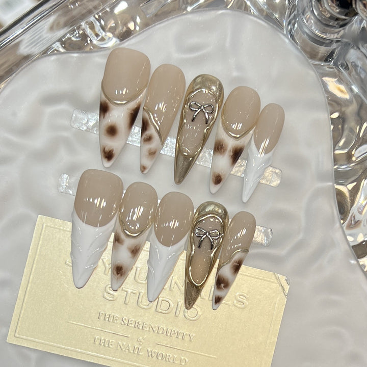 Elegant Stiletto Press-On Nail Set with Decorative Accents Stornfield