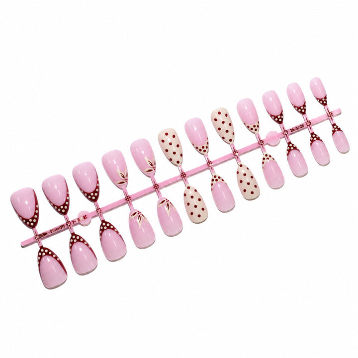Elegant artificial nails with floral and dotted design Stornfield