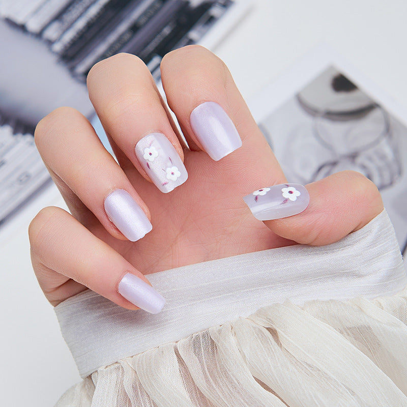 Artistic nail extensions with floral accents Stornfield